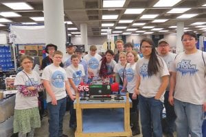 Ice Storm rules! Some of the members of the Cook County Schools robotics team at their workstation at the Duluth Entertainment and Convention Center. (L-R, front) Nina Woerheide, Adrian Howard-Larsen, John Vander Heiden, Joseph James, David Blackburn, Shae Morawitz, Sarah Carman, Jaden Aubid, Lohnen Vondall. (L-R, back) Caleb Phillips, Coach Daniel Henry, Noah Works, Andy Kern, Bergen Soland, Assistant Coach Tom Nelson. The team finished 6th out of 60 teams at the regional competition.