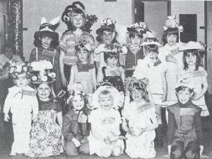 Donning their Easter bonnets on April 5, 1980, these local youngsters visited the residents at the Cook County Nursing Home. The creative participants, front row from left, are Stacy Schulte, Kim Schulte, Jennifer Kinzer, Alisha Smith, Sarah Williams and Lisa Adams. In the middle row are Sarah Adams, Jessi Neal, Jessi Smith and Heather Spry. In the back row are Katie Smith, Beverly Adams, Donna Gestel, Betsy Crosby and Molly Sommerness. First-place winner in the pre-school through kindergarten category was Alisha Smith, and in the first- through third-grade category Molly Sommerness. After the fashion show, all were treated to cupcakes, ice cream and punch. The event was sponsored by St. John’s Altar Society.