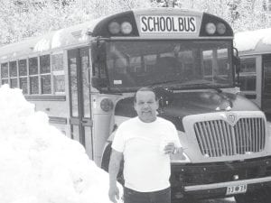 Another tough Elder is Larry “Fish” Deschampe. The local school bus driver in his usual short sleeve shirt out and about on that stormy day.