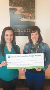 Cascade Vacation Rentals (CVR) sponsored a wellness challenge for staff with a trip to Las Vegas as the prize. Marketing Coordinator Hannah Hoaglund (right) was happy to present the prize to Katterine Payer. The trip will be extra-special for Katterine as family visiting from Peru will be able to meet her there.