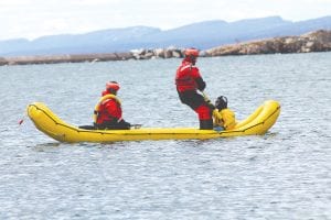 The Cook County Emergency Services Conference on April 29-30 had many exercises for emergency responders, such as this cold water rescue. Steven Gray of the Lutsen Fire Department is the “victim” being rescued by the U.S. Coast Guard.