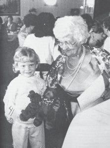 Model Melanie Smith greets her grandmother, Muriel Smith, at the North Shore Hospital Auxiliary Style Show held May 20, 1989.