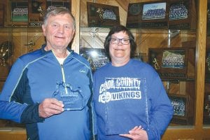 Retired Cook County High School teacher, coach and athletic director Lyle Anderson was recently inducted into the Polar League Hall of Fame. Current CCHS Athletic Director Pam Taylor presented the award to Anderson at the banquet.