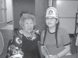 Grand Portage Elders have been enjoying spring! The Elders' Powwow on May 7 gave an opportunity for Elders to visit with friends and family. Ellen Olson visited with Grand Portage Senior Princess Samantha Scalise.