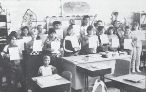 Shown in this May 22, 1989 photo are fourth-, fifth- and sixth-grade students in Mr. Davis’s Grand Portage class holding the compositions they recently put in the word processor. Kneeling in front is Billy Owens. In the front row, from left, are Daniel Deschampe, Cory Dahl, Dama Vondall, Nadine Owens, Matt Hendrickson, Dustin Tavener, Chad Spry and Carrie Aune. In the back row are Beth Gagnon, Jenny Bedford, Jeff Cassels, Freedom Porter, Jill Ford, Kyle Tesser, Keith Dahl and Stephanie Tibbetts.