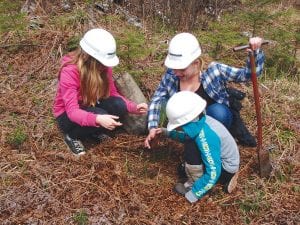 Taking advantage of trees provided by Hedstrom Lumber Company, students from Great Expectations School planted 250 trees at Pincushion Mountain on Friday, May 13. The trees were planted by mixed-age teams of students under the direction of Myra Theimer and Erica Hahn of the U.S. Forest Service. The U.S. Forest Service provided tools and equipment for the project. The effort was a service component of the school’s program that emphasizes environmental literacy and integrated, hands-on learning.