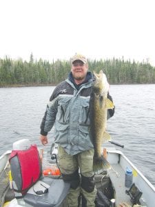 Tails from the Trail columnist Cory Christianson, who shares tales of his outdoor adventures with News-Herald readers each week, had a great fishing opener weekend, despite cold and windy weather. Christianson shows off the nice 32.5-inch walleye he caught and released on Saganaga Lake.