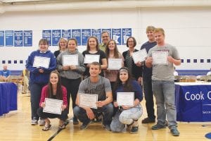 Left: Nine students received scholarships to Lake Superior College from the Lloyd K. Johnson Foundation. (L-R, kneeling) Bethany Derscheid, Andrew Fenstad-Lashinski, Erica Weisberg. (L-R, standing) Courtney Clyde, Foundation Director Joan Gardner-Goodno, Trace McQuatters, Natassja Sheils, Foundation Board Member Bill Hansen, Alex Slanga, Scholarship Program Assistant Sarah Goldberg, Jack Wieben, Dylan Works.