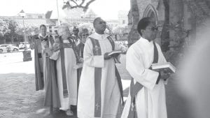 Mary Ellen Ashcroft, vicar of Spirit of the Wilderness Episcopal Church in Grand Marais, took part in a Palm Sunday procession at an Anglican Cathedral in Grahamstown, South Africa during her recent sabbatical.