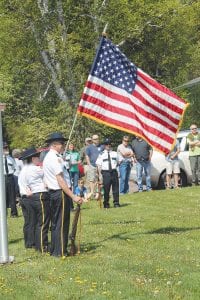 A large crowd gathered on the lawn of the Cook County courthouse on Monday, May 30 to join American Legion Post 413 in an observance of Memorial Day. The Cook County High School choir and band members participated in the ceremony, along with the Legion Honor Guard and Auxiliary.