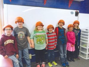 Ms. Sandeford’s Birch Grove second graders pose in the hard hats they made to be used as table decorations for the Schroeder Area Historical Society’s Annual Meeting and Community Dinner, Saturday, June 11.