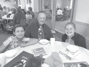 Seniors enjoyed reading to—and listening to—the 4th-graders during the Intergenerational Reading Program.