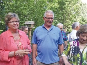 Minnesota Representative (District 3A) Rob Ecklund visited the North Shore on Tuesday, June 21, spending time at the Cook County commissioners' meeting and later spending time with community members like Bonnie Gay Hedstrom (left) at a gathering at the home of Hal Greenwood in Grand Marais.