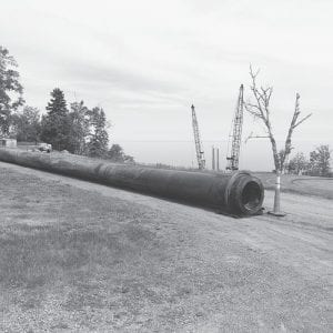 This huge pipe—three feet in diameter—is part of the Lake Superior- Poplar River Water District waterline. It sat above ground for almost a year, but is now in place at the Lake Superior inlet.