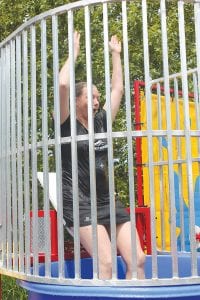 Left: Molly Wickwire gets dunked to raise money for the Lutsen Junior Alpine Team. Above: The competition at the Minnow Races was fast and furious.