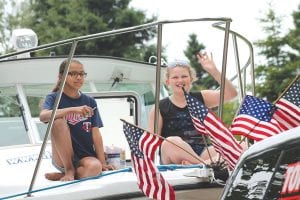 Happy 4th of July! There was a great turnout at the West End 4th of July celebration. The parade was colorful and fun as always. The Tofte Charters float was a fishing boat decked out in red, white and blue. More 4th of July fun can be seen inside on page A3.