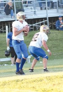 Kurt Steele gets set to throw a successful pass for the White team.