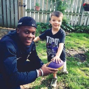 Above: Viking quarterback Teddy Bridgewater gives Obadiah Gamble a football. Right: Weeks later Obadiah was invited to a Vikings training camp where he showed off his receiving skills. Obadiah’s video birthday invitation to Bridgewater can be seen on Facebook.