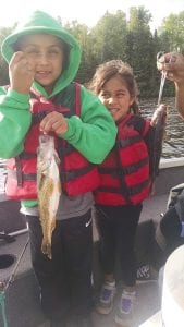 Jaidev, 7, (left) and Jaya, 5, of Ames, Iowa, had a fantastic day of fishing with Joe Carlson of Joe’s Inland Fishing. Jaidev caught his first walleye and Jaya her first fish ever. Both fish were caught on a chartreuse Beaver Fick in 7 feet of water.