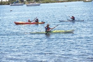 Stone Harbor employees gave instructions to people who wanted to try kayaking in the harbor. About 300 people took part in the activities and demonstrations over the two-day festival.