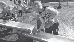 Children enjoy the outside area of the Busy Bees daycare at the Cook County Community YMCA. The Y’s daycare program has received endorsement of the Minnesota Department of Human Services Parent Aware program.