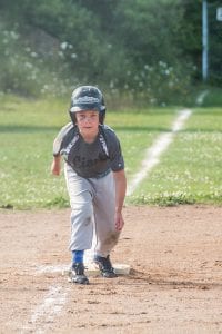 He’s not a thief, but this little Lions player would gladly steal home if he could.