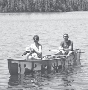 The new operators of Sawbill Canoe Outfitters were able to take their infant daughter Kit on her first canoe ride recently to visit adventurers Dave and Amy Freeman on Alton Lake in the Boundary Waters.