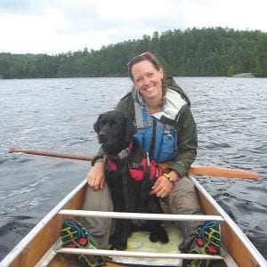 Tessa Larson and her dog Avery are part of a group of canoeists spending most of their summer paddling and portaging to Hudson Bay. The group of four women—all former employees of Wilderness Canoe Base—are using the trip to raise funds for the camp.