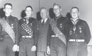 Growing up on the Gunflint Trail gave Bruce Kerfoot (second from left) plenty of opportunities to fulfill the requirements for badges with the Boy Scouts. He continued being involved in Scouting as an adult, despite being busy running Gunflint Lodge.