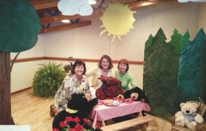 Top: Organizers of the West End Flower Show on July 23 were (L-R) Co-chairs Debby Rebischke, Julie Bittinger and staging chair Linda Walker. They paused to relax in the sun and shade. Beautiful floral arrangements in the Schroeder town hall carried out the Everything under the Sun…and Shade theme.