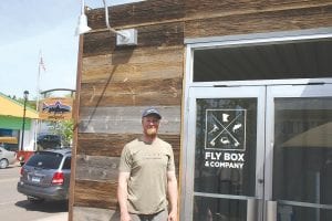 The Entrepreneur Fund and the Small Business Development Center in Cook County have helped an impressive list of businesses over the last year. Above: One is the Fly Box, a “pop-up” store on First Avenue in Grand Marais, owned and operated by Scott Sorensen. Left: Another is Fika Coffee, which was able to expand its operations into a shop in Lutsen where roasting and grinding is done in the same space that tasty coffee is served.