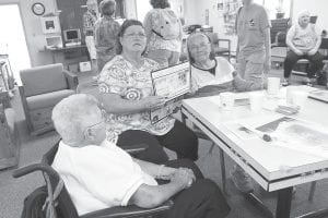 Several folks from the North Shore Health Care Center came to the Old-Timers Gathering. (L-R) Bernice LeGarde, Nora Bockovich with Care Center Activities Department, and Gloria Martineau.