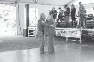 WTIP has announced the lineup for the ninth annual Radio Waves Music Festival on September 9-11. The weekend features over 20 local acts as well as five regional acts in the big tent at the Grand Marais Recreation Park campground. This couple had the dance floor to themselves—a rare occurrence at the family-friendly event— during a performance of the Curry Family Band at last year’s celebration.