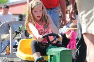 Kids gave it their all in the Pedal to the Medal Tractor Pull on Saturday. Hailey Smith of Grand Marais took 2nd place in the 6-year-olds class.