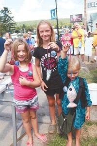 There were also dozens of excited kids at the Minnow Races on Saturday. The winners were (LR) Sylvie Lagine, Paige Haugan, Eloise Silence.