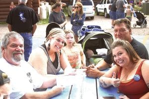 The Bautch team of Lauren, Natalie, Stan Jr. and Bethany made quick work of two 64-ounce Blizzards in one minute and 21 seconds to take home $100 in Dairy Queen certificates. The Bautch team finished second last year and were 2014 Dairy Queen Blizzard eating champions.