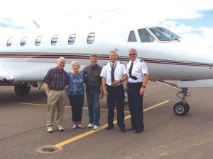 The first commercial jet that landed on the newly expanded runway at Grand Marais/Cook County Airport on Friday, August 5 was a NetJets plane from the Detroit City Airport. Paul and Carol Schaap of Grosse Pointe Park, Michigan, were delighted with the runway conditions that allow them to make the trip from Michigan to their Clearwater Lake cabin in less than two hours. (L-R) Paul Schaap, Carol Schaap, Airport Manager Rod Roy and NetJets pilots Doug Koch and Mike Lauffler.