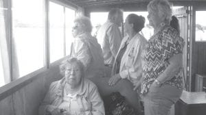 Elders enjoyed a ride aboard the Voyageur II out to see the Mist of Avalon in Grand Portage bay on the first day of Rendezvous Days. (L-R) Doris Blank, Grand Portage’s most senior Elder, Ellen Olson, Jason Burnett, Shirley Stevens and Carol Hackett.