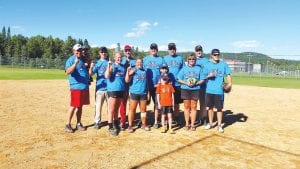 The Big Red Army took the championship in the 2016 Grand Portage Rendezvous Days Mixed Softball Tournament. (L-R, front) Jodi Smith, some young softball fans, Debbie Bakke, Owen Anderson. (L-R, back) Chris Smith and Jase, Nick Hingos, Jason Donek, Charles Christiansen, Mike Christiansen, “Canada John.” Debbie Bakke was named female MVP in the tournament.