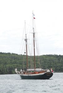 The Mist of Avalon from Nova Scotia anchored off shore at the historic fur trade depot during Rendezvous Days on Friday through Sunday, August 12-14. The schooner was too large to come ashore, so the Grand Portage National Monument and Grand Portage-Isle Royale Transportation Line partnered to take visitors out for a closer look at the stately vessel. Over a thousand people took advantage of the free ferry ride aboard the Voyageur II on Friday or the Sea Hunter on Saturday.