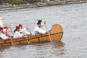 Above: Also on the waters of Lake Superior during Rendezvous was this Montreal canoe, the sturdy birchbark vessels used to transport furs and supplies. Although small, a Montreal canoe could carry four tons. Right: Practicing their lacrosse skills were Lily and Quin, while Lily’s brother Owen oversees the action.