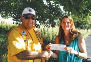 The winner of the 2016 Fisherman’s Picnic grand prize was April Studer, Monticello, Minnesota. When Lions Club President Bob Spry called Studer, she didn’t believe him at first. He had to keep repeating over and over again that she was a winner. Grand Marais Lion Mark Sandbo meet with the very happy Studer by the Mall of America to present the $10,000 grand prize.