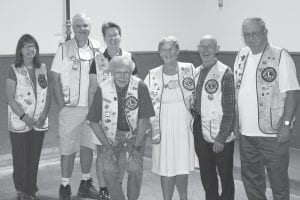 On the current Grand Marais Lions Club board are (L-R) Barb Backlund, 2-year board member; Randy Woodward, lion tamer; Cheryl Woodward, 1st vice president; Mike Carlson, president; Millie Spry, secretary; Bob Spry, treasurer; Gene Erickson, 2nd vice president and tail twister. (Not pictured Rob Hackett, 3rd vice president; Pete Kavanaugh, 2-year board member; Darold Rosbacka, 1-year board member; Ken Wielinski, 1-year board member.)