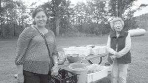 Dana Logan and Elder Ellen Olson taking advantage of surplus veggies at the Cache Crop Market on Tuesdays at the Grand Portage Clinic parking lot.