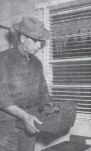 These Oct. 13, 1960 photos show the new U.S. Border Patrol building on Highway 61, just east of Grand Marais; and Ray Dorr, local Border Patrol chief, moving in his typewriter as the new office rooms were being made ready for occupancy.