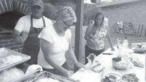 W.E. Connect hosted its last regular Pizza Night at Birch Grove Community Center last Tuesday. Participants brought their own toppings and enjoyed the last brick oven pizzas of the season.