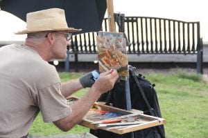 Artists everywhere! The Grand Marais Art Colony hosted the 2016 Plein Air in Cook County on September 9-16, bringing artists and their easels to scenic—and not so scenic—spots. Scott Lloyd Anderson had an interesting technique for the Thursday, September 15 Quick Paint Competition. He coaxed in seagulls with leftover pizza and quickly captured the animated birds on canvas. Plein Air works will be on display at the Johnson Heritage Post and the Grand Marais Art Colony until November 13.