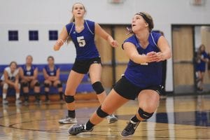 Meredith Sutton (No. 5) tracked the ball with her eyes while Emily Jacobsen seemingly bent gravity to make the play on the volleyball. Both Sutton and Jacobsen play the front row for the Vikings but each is adept at setting up her teammates with a nice bump.