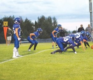 Preparing for the snap, the Viking defense gets ready to stop the play. Although this year’s squad is young and somewhat undersized, they make up for it with team speed and enthusiastic tackling.