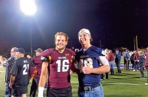 CCHS graduates Kale Boomer (No. 16) and Leo Johnson were happy to see each other following the UMD win over the Concordia Bears last Saturday. Boomer plays for the UMD Bulldogs and Johnson for the Golden Bears.